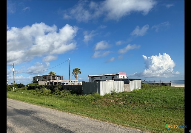 view of street featuring a water view