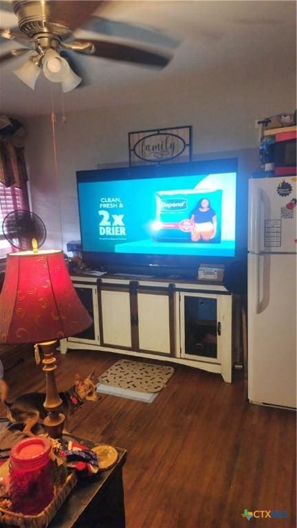 701 E Anaqua Ave, Victoria, TX 77901 - living area with dark wood-type flooring and a ceiling fan