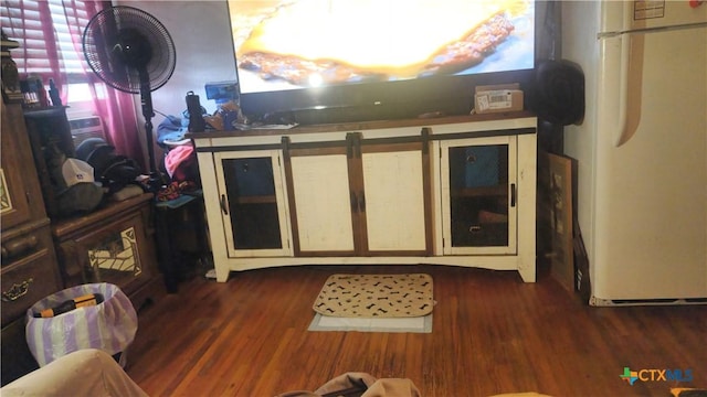 701 E Anaqua Ave, Victoria, TX 77901 - living room featuring dark wood-style floors