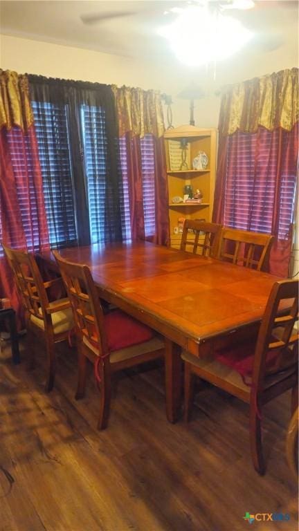 701 E Anaqua Ave, Victoria, TX 77901 - dining room featuring wood finished floors and a ceiling fan