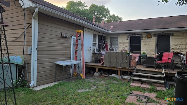 701 E Anaqua Ave, Victoria, TX 77901 - deck at dusk featuring cooling unit