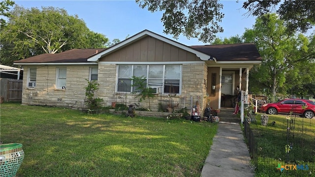 701 E Anaqua Ave, Victoria, TX 77901 - ranch-style home with stone siding and board and batten siding