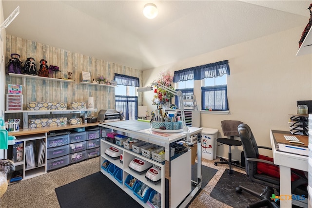 office area with carpet flooring and vaulted ceiling