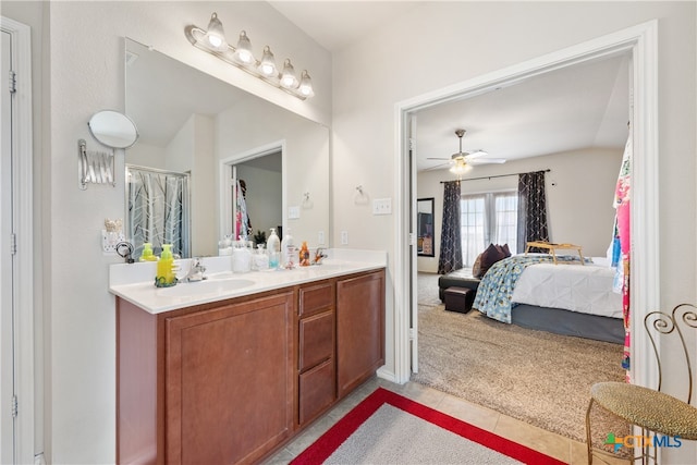 bathroom featuring vanity and ceiling fan