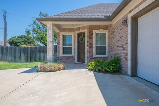 entrance to property with a garage