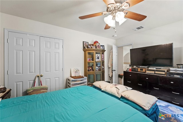 bedroom with a closet and ceiling fan