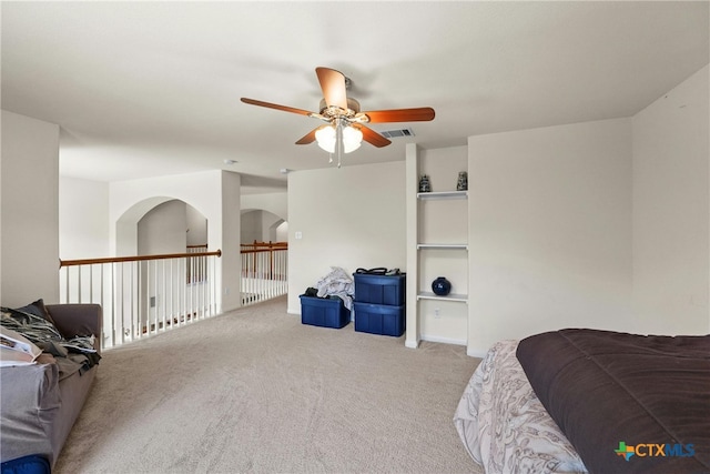 interior space featuring ceiling fan