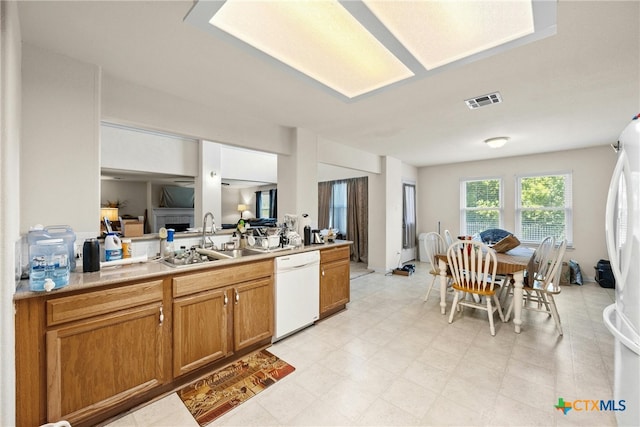 kitchen with white appliances and sink