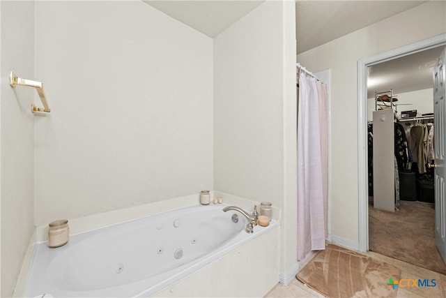 bathroom with a tub to relax in