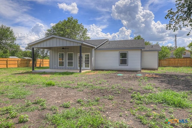 5073 Cedarside, San Marcos, TX 78666 - rear view of house with ceiling fan, french doors, a fenced backyard, a patio, and board and batten siding