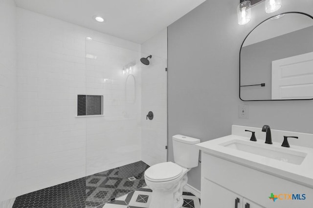 5073 Cedarside, San Marcos, TX 78666 - bathroom featuring vanity and tiled shower