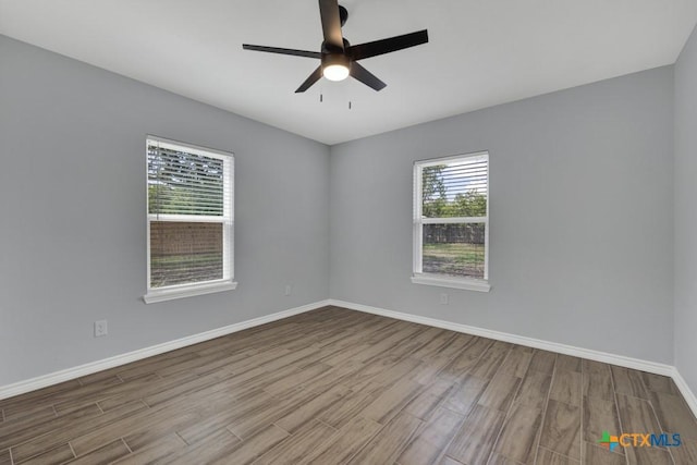 5073 Cedarside, San Marcos, TX 78666 - unfurnished room with wood finished floors and ceiling fan