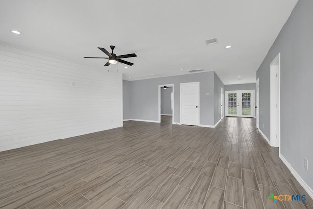 5073 Cedarside, San Marcos, TX 78666 - unfurnished living room featuring wood finished floors, a ceiling fan, french doors, and recessed lighting