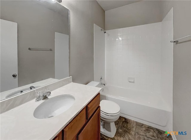 full bathroom with tiled shower / bath combo, toilet, and vanity