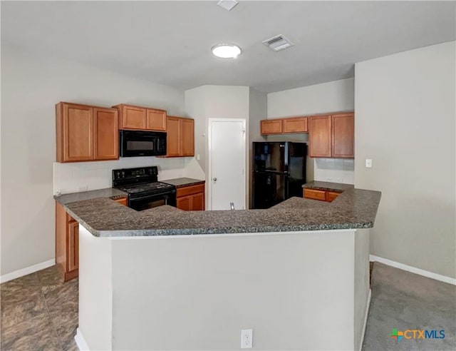 kitchen featuring kitchen peninsula, light carpet, and black appliances