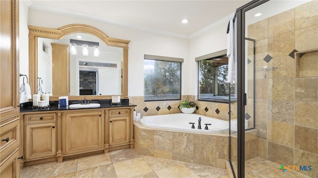 bathroom with vanity, ornamental molding, and plus walk in shower