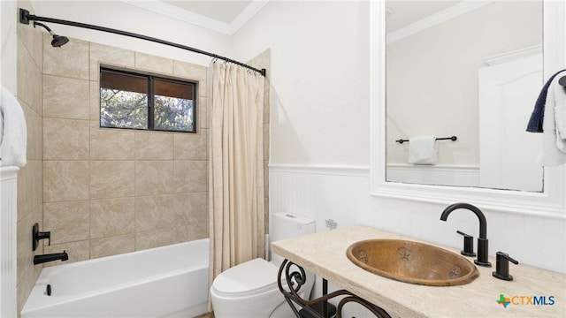 full bathroom with shower / tub combo, toilet, ornamental molding, and sink