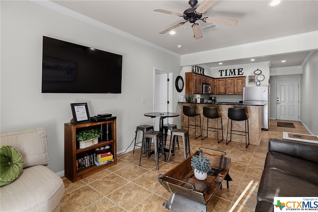 living area with ceiling fan, recessed lighting, visible vents, and crown molding