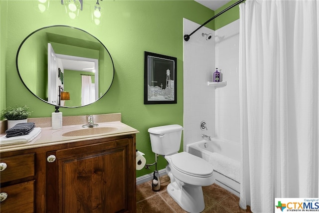 bathroom featuring toilet, shower / bath combo with shower curtain, vanity, and tile patterned floors