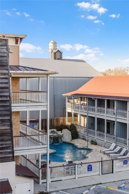 pool featuring a patio area