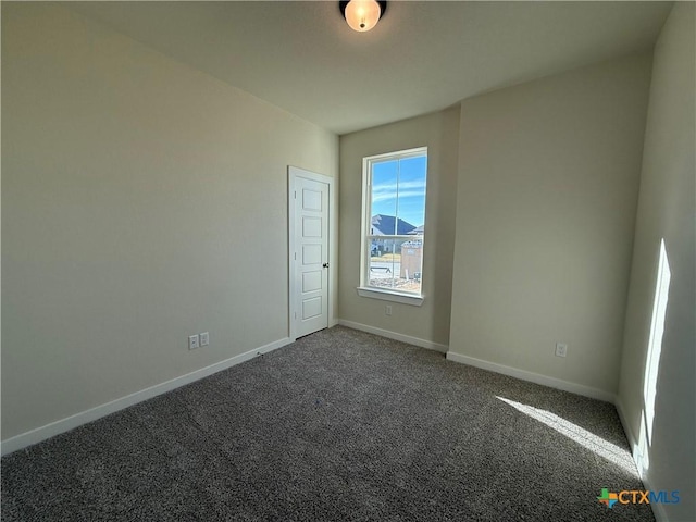 view of carpeted spare room