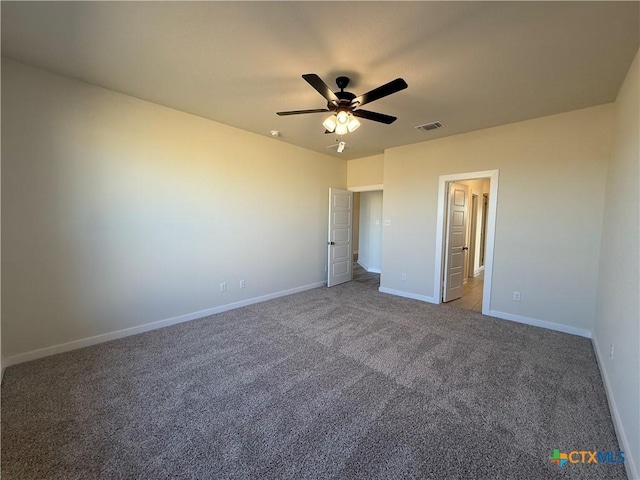 unfurnished bedroom featuring ceiling fan and carpet