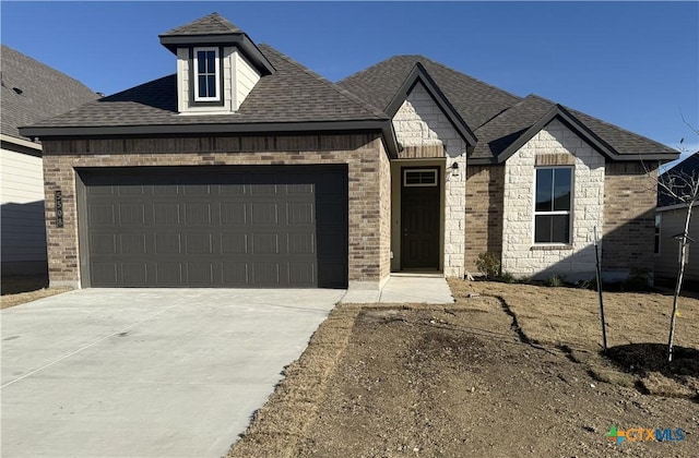 view of front of house with a garage