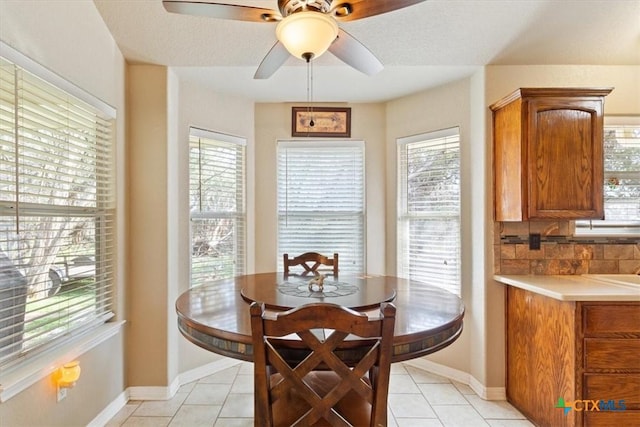 dining space with light tile patterned floors