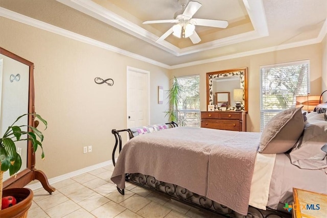 tiled bedroom featuring a raised ceiling, crown molding, ceiling fan, and multiple windows