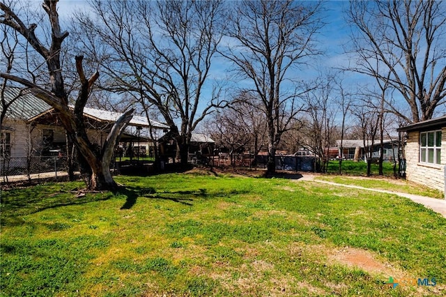 view of yard featuring fence