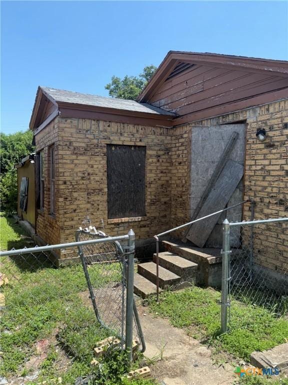 1702 E Heritage Ave, Temple, TX 76501 - view of property exterior with brick siding