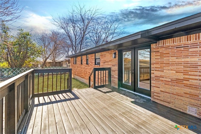 wooden deck featuring fence