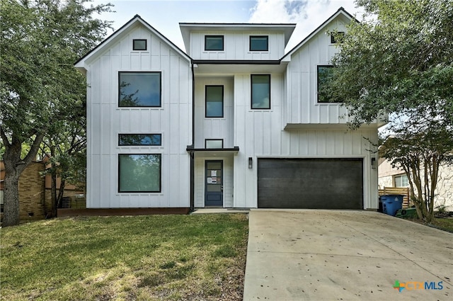 modern farmhouse style home with a garage and a front yard