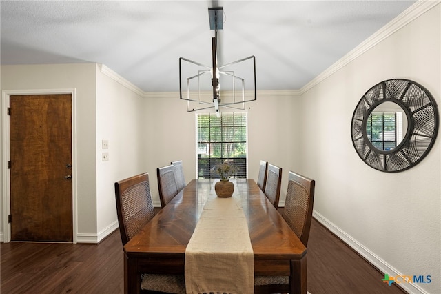 2711 Oak Leigh St, San Antonio, TX 78232 - dining space featuring wood finished floors, a chandelier, and crown molding