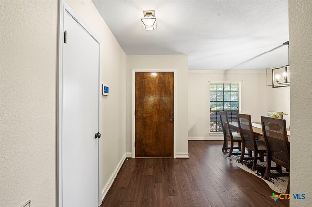 2711 Oak Leigh St, San Antonio, TX 78232 - foyer with wood finished floors and ornamental molding