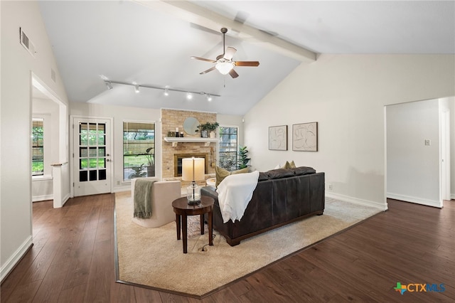 2711 Oak Leigh St, San Antonio, TX 78232 - living room with ceiling fan, dark wood-style flooring, and a large fireplace