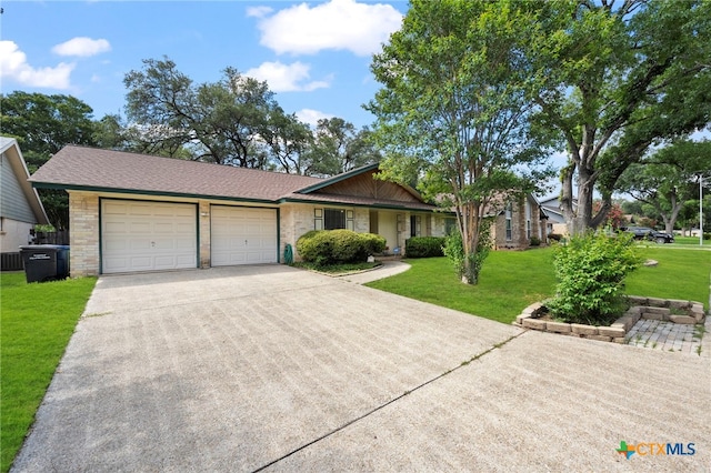 2711 Oak Leigh St, San Antonio, TX 78232 - ranch-style home featuring driveway, an attached garage, a front yard, and brick siding
