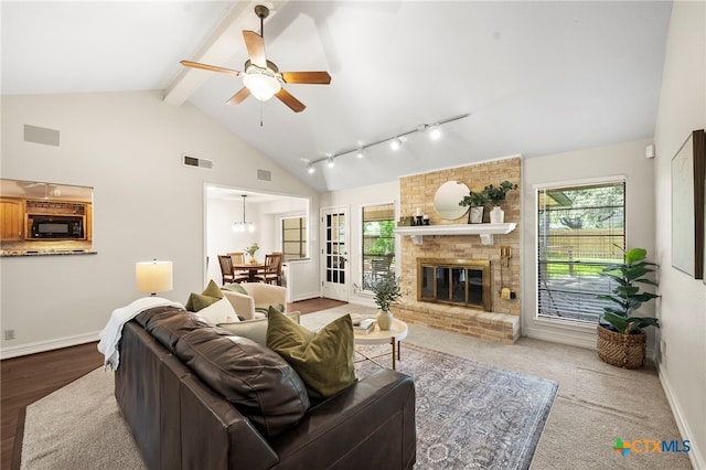 2711 Oak Leigh St, San Antonio, TX 78232 - living area featuring ceiling fan and a fireplace