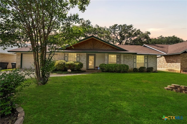 2711 Oak Leigh St, San Antonio, TX 78232 - ranch-style home with a front yard and an attached garage