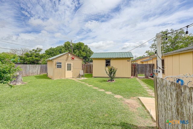 view of yard featuring a storage unit and cooling unit