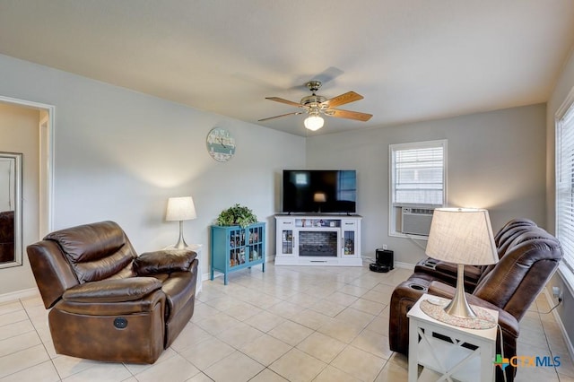 tiled living room featuring ceiling fan and cooling unit