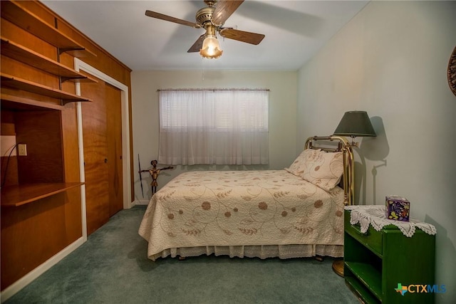 carpeted bedroom with a closet and a ceiling fan