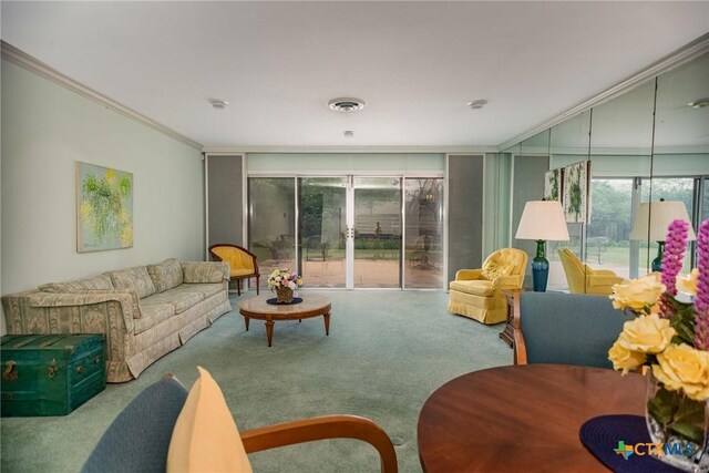 living area featuring carpet floors, ornamental molding, and visible vents