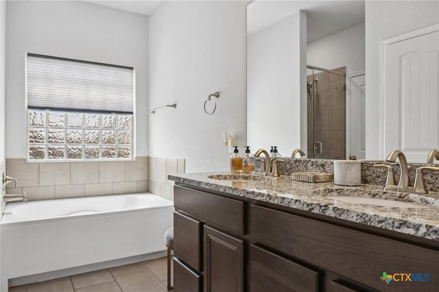 2516 Arno St, Harker Heights, TX 76548 - full bathroom featuring a bath, double vanity, tiled shower, and tile patterned floors