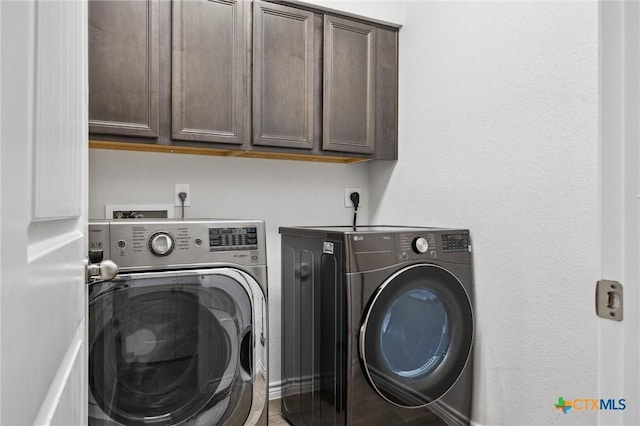 2516 Arno St, Harker Heights, TX 76548 - laundry room featuring cabinet space and washer and dryer