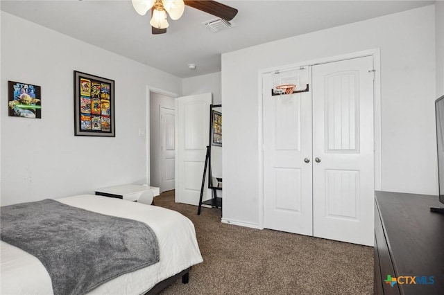 2516 Arno St, Harker Heights, TX 76548 - bedroom with dark carpet, a closet, and ceiling fan