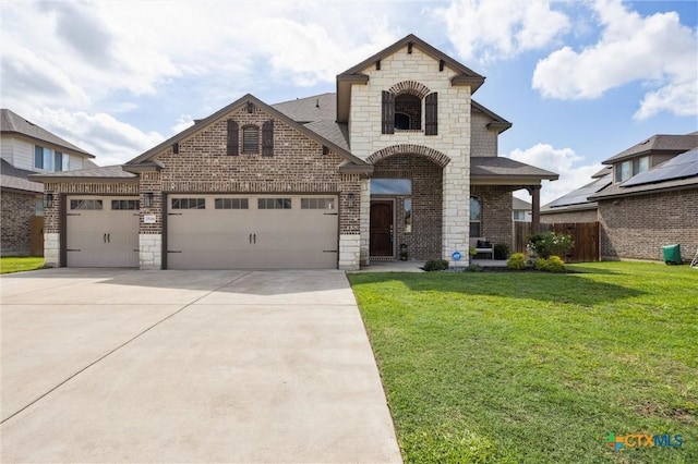 2516 Arno St, Harker Heights, TX 76548 - french provincial home featuring stone siding, a garage, driveway, brick siding, and roof with shingles