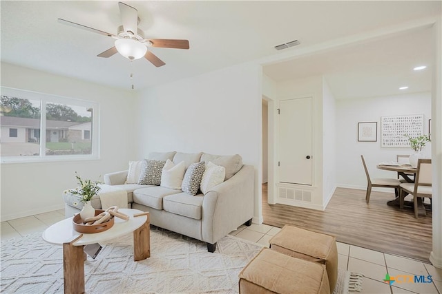706 Joe Morse Dr, Copperas Cove, TX 76522 - living area featuring light tile patterned floors, ceiling fan, recessed lighting, and baseboards