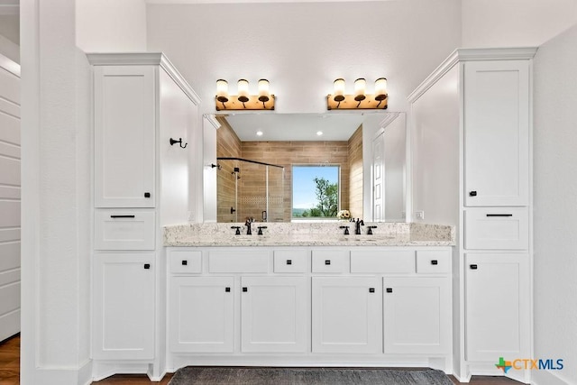 213 Lets Roll Dr, Fischer, TX 78623 - full bathroom with a stall shower and double vanity