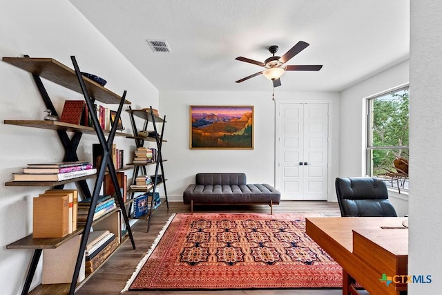 213 Lets Roll Dr, Fischer, TX 78623 - office area featuring a ceiling fan, wood finished floors, and baseboards